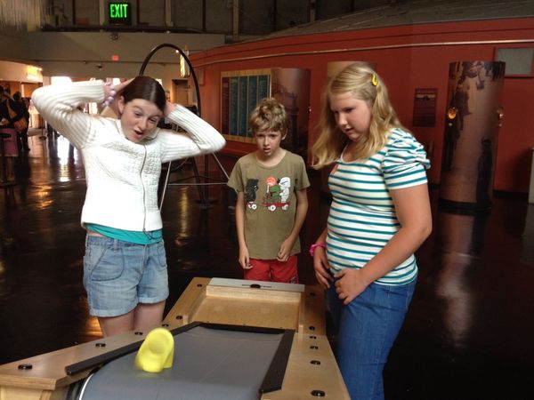 Slinky in a conveyor belt at the Exploratorium